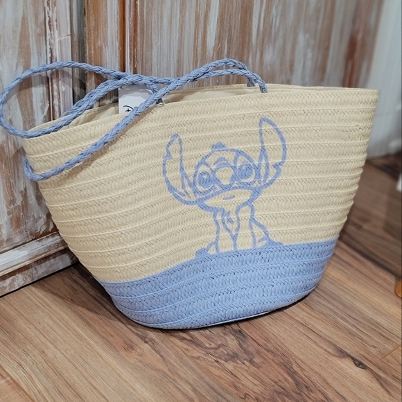 Disney Handbags - NWT Exclusive Stitch Woven Tote
